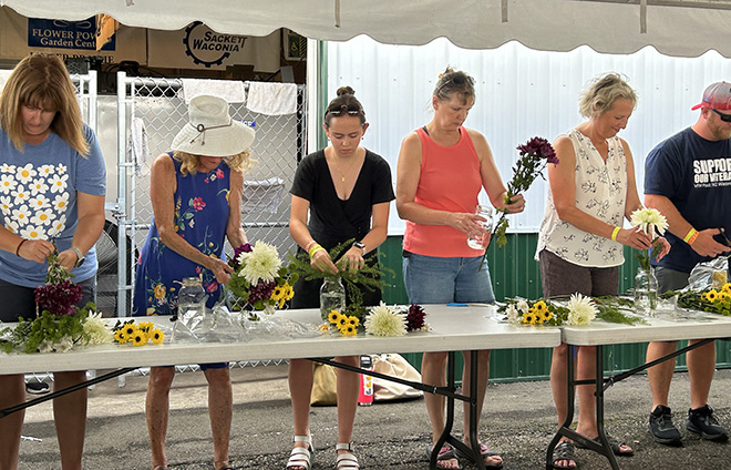 people arranging flowers during the flower arranging contest