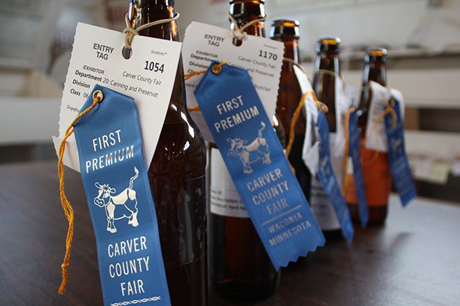 Carver County Fair blue ribbons on craft beer bottles
