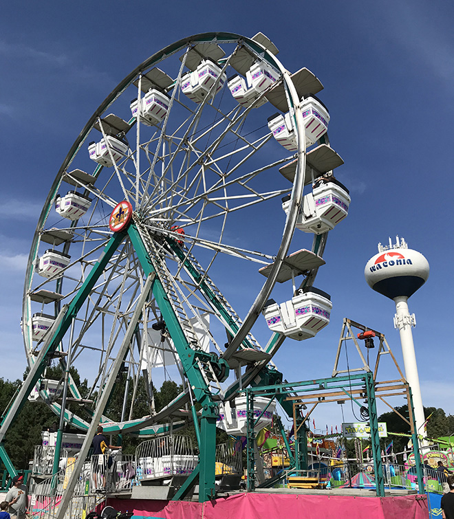 Ferris wheel and Waconia water tower at the Carver County Fair midway