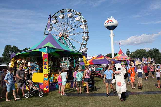 Tippy the cow on the Carver County Fair midway