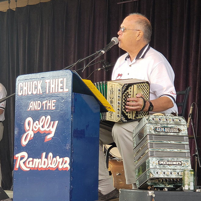 Chuck playing the accordion with the Jolly Ramblers